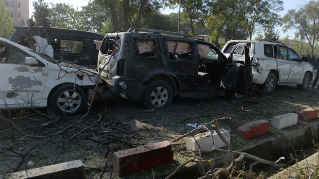 Damaged vehicles of foreign troops are seen at site of what local police said was suicide attack in Kabul, Afghanistan on September 16, 2014 