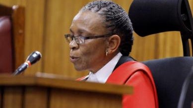 Judge Thokozile Masipa reads her verdict during the trial of Olympic and Paralympic track star Oscar Pistorius 