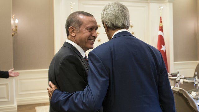Turkish President Recep Tayyip Erdogan speaks with Secretary of State John Kerry 