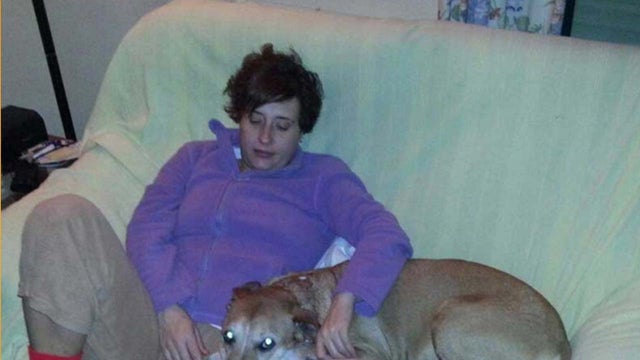 Teresa Romero Ramos, the Spanish nurse who contracted Ebola, is pictured with her dog Excalibur in this undated handout photo provided 