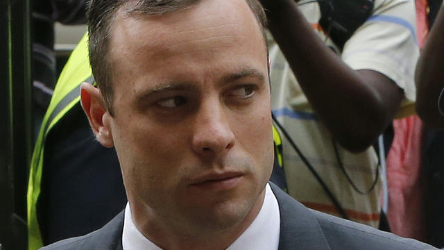 South African Olympic and Paralympic sprinter Oscar Pistorius arrives at the North Gauteng High Court in Pretoria 