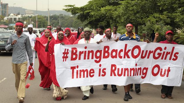 Campaigners from "#Bring Back Our Girls" march during a rally calling for the release of the Abuja school girls who were abducted by Boko Haram militant 