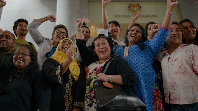 Transgender activists celebrate outside the court of appeals in Putrajaya  