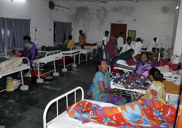 Women who underwent botched sterilization surgeries at a government mass sterilization "camp" receive treatment at a district hospital in Bilaspur, in the eastern Indian state of Chhattisgarh 