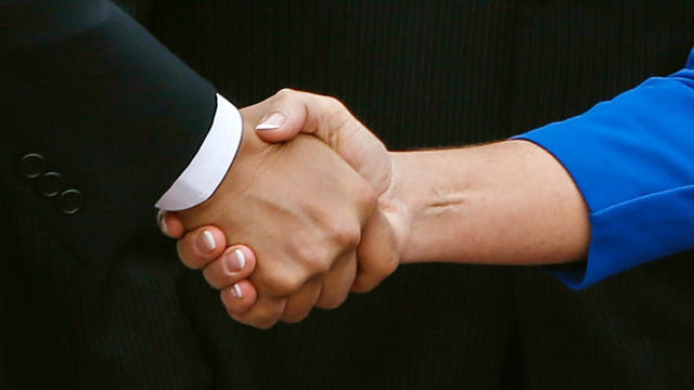 Fist bump, handshake, high-five: Which spreads the most germs? - CBS News