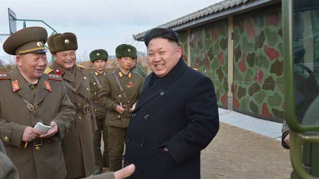 North Korean leader Kim Jong Un (R) inspects the Artillery Company under the Korean People's Army (KPA) Unit 963, which started a new year combat and political drill, in this undated photo released by North Korea's Korean Central News Agency in Pyongyang 