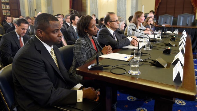 National Football League Executive Vice President of Football Operations Troy Vincent, left, sits at the witness table on Capitol Hill in Washington Dec. 2, 2014, during testimony before the Senate Commerce Committee hearing on domestic violence in profes 