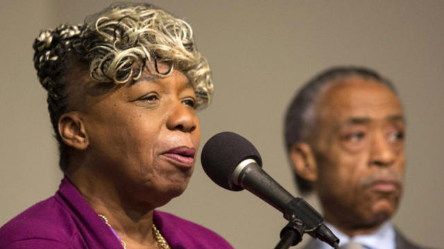 Eric Garner's mother, Gwen Carr, and the Rev. Al Sharpton at Sharpton's National Action Network House of Justice in New York Dec. 6, 2014, announce a march against police violence to be held Dec. 13, 2014, in Washington. 