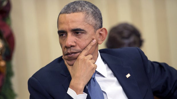 President Obama is seen during a meeting with King Abdullah II of Jordan in the Oval Office at the White House Dec. 5, 2014, in Washington. 