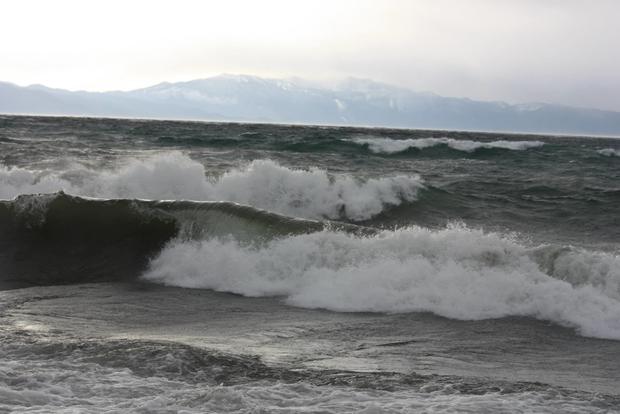 Massive waves on Lake Tahoe, as surfers trade snowboards for their summer boards during gale-force winds, December 11th, 2014 