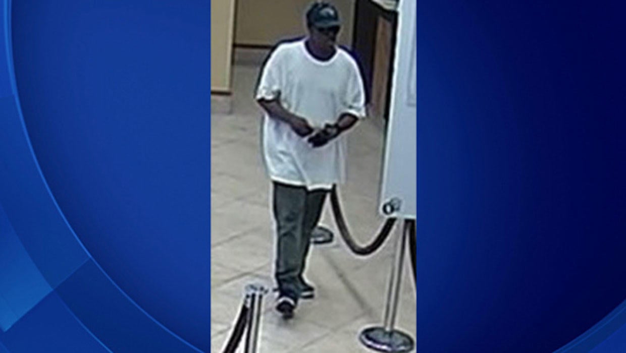 FBI releases photos of Miami bank robber - CBS News