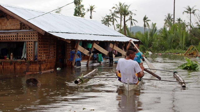 philippinesstorm2014-12-31t055950z715994247gm1eacv11ur01rtrmadp3southeast-asia-floods.jpg 