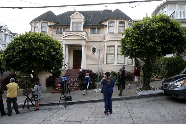 Well-wishers and media members gather at San Francisco home where actor and comedian Robin Williams starred in 1993 movie "Mrs. Doubtfire," on August 12, 2014; Williams was found dead in his Marin County home of apparent suicide 