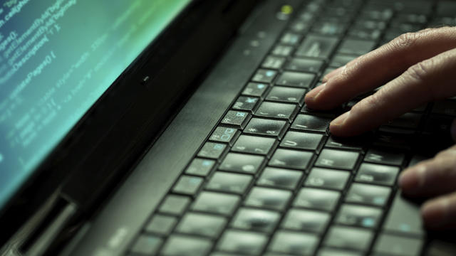 Hands on computer keyboard 