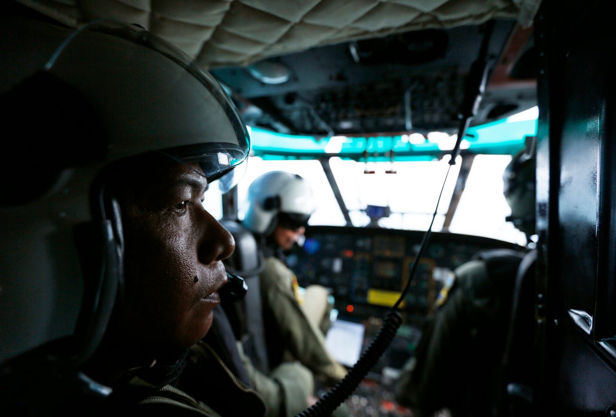 Tail of missing AirAsia jetliner found in Java Sea - CBS News