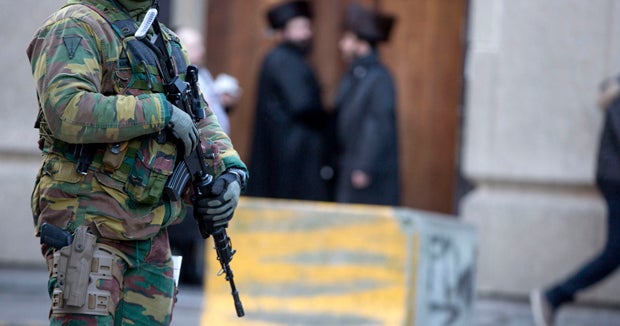 Belgium guards possible terror targets amid manhunt - CBS News