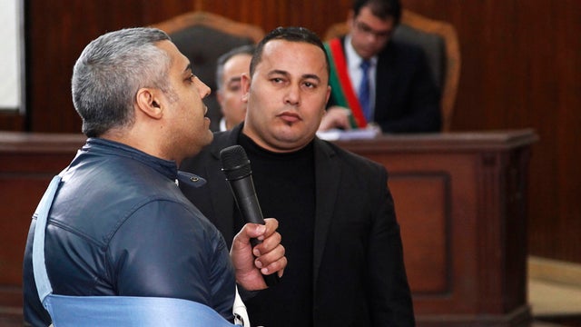 Al Jazeera journalist Mohamed Fahmy speaking before judge in Cairo court on February 12, 2015 