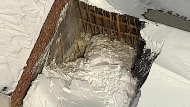 An aerial view shows the aftermath of a roof collapse at a shopping plaza in Sutton, Massachusetts, Feb. 18, 2015. 