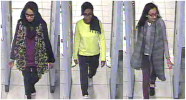 British teenage girls Shamima Begun, Amira Abase and Kadiza Sultana (L-R) walk through security at Gatwick Airport 