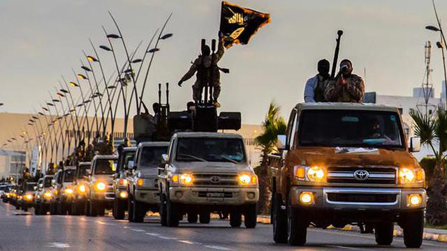 ​ISIS militants drive in procession through the northeastern Libyan city of Sirte 
