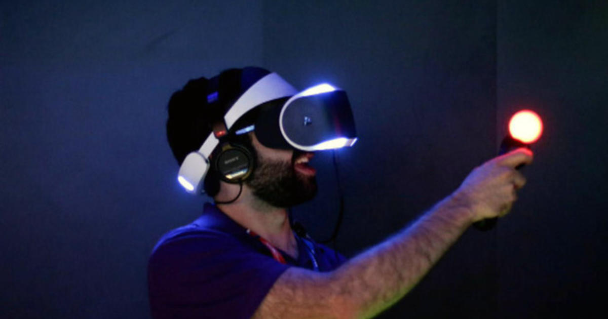 Virtual reality headsets put you in the video game CBS News