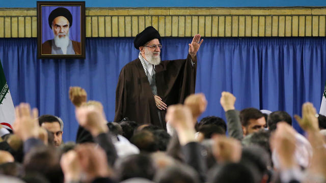 Iranian Supreme Leader Ayatollah Ali Khamenei waves at a meeting with a group of environmental officials and activists at his residence in Tehran 