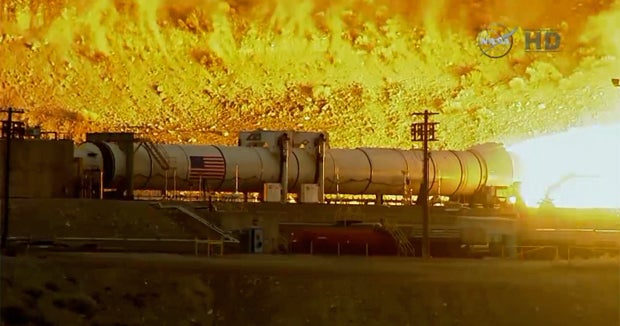 Mega rocket booster put through fiery test - CBS News