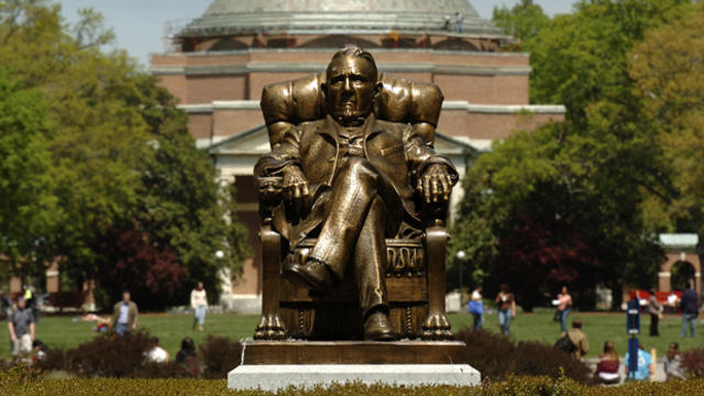 The statue of Washington Duke on Duke University's East Campus with Baldwin Auditorium is shown April 11, 2006, in Durham, North Carolina. 