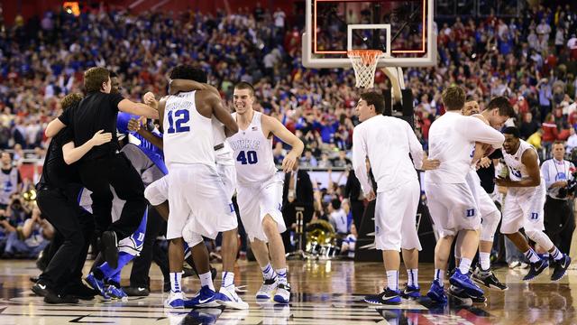 Duke Blue Devils celebrate after defeating Wisconsin Badgers, 68-63, in 2015 NCAA Men's Division I Championship game at Lucas Oil Stadium in Indianapolis on April 6, 2015 
