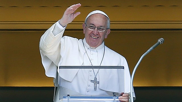 Pope Francis gestures as he leads the Angelus prayer from the window of the Apostolic Palace in Saint Peter's Square at the Vatican 