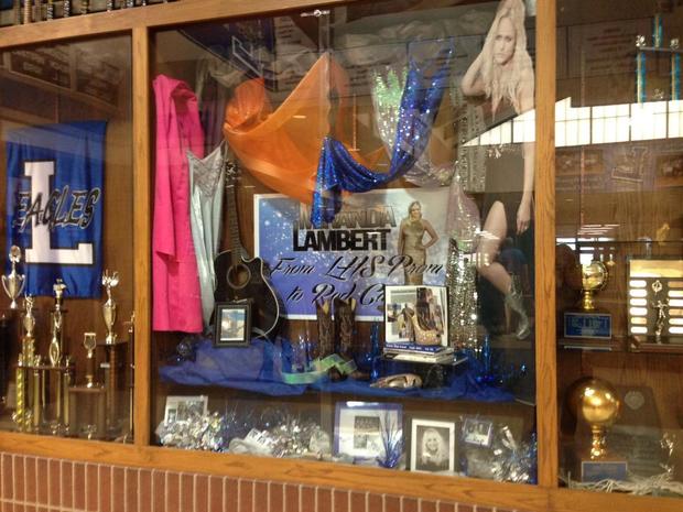 009-lamberts-prom-dresses-on-display-the-biggest-star-lindale-has-ever-produced-her-teacher-says.jpg 
