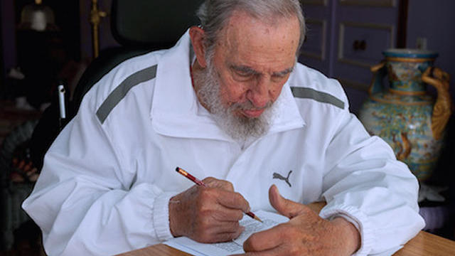 Former Cuban President Fidel Castro votes during local elections held throughout Cuba April 19, 2015, in Havana in this handout picture released by Cuban official website www.cubadebate.cu. 