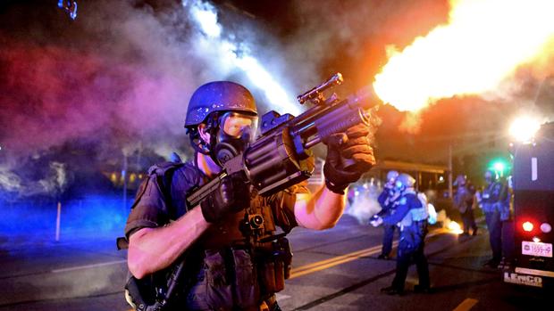 Tensions flare in Ferguson, Mo., over police shooting 