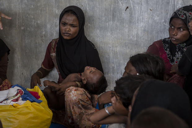 Rohingya women and children are seen after arriving at the port in Julok village, May 20, 2015, in Kuta Binje, Aceh Province, Indonesia 