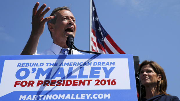 Former Maryland Gov. Martin O'Malley is joined by his wife, Katie O'Malley, as he announces his intention to seek the Democratic presidential nomination during a speech in Federal Hill Park in Baltimore, Maryland, May 30, 2015. 