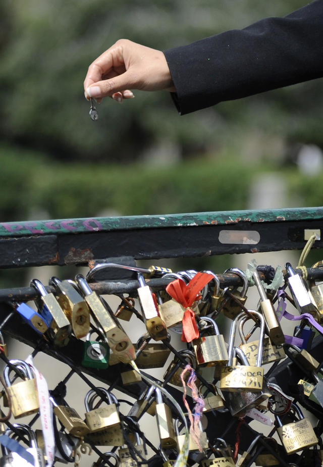 Paris 'love locks' removed from Pont des Arts bridge – in pictures, World  news