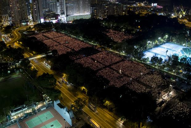 Tens of thousands of people attend an annual candlelight vigil atVictoria Park in Hong Kong, June 4, 2015, to mark Beijing's Tiananmen Square crackdown 