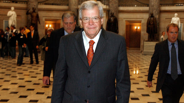 Former Speaker of the House Dennis Hastert, R-Illinois, walks through Statuary Hall on his way to the House floor to make his farewell address to Congress Nov. 15, 2007, in Washington. 