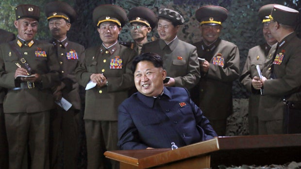 North Korean leader Kim Jong Un watches a night naval fire strike drill in this undated photo released by North Korea's Korean Central News Agency (KCNA) June 16, 2015. 