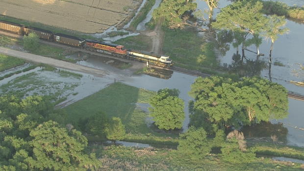 train in levee breach flood 