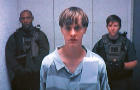 Dylann Roof appears by closed-circuit television at his bond hearing in Charleston, South Carolina, June 19, 2015, in a still image from video. 