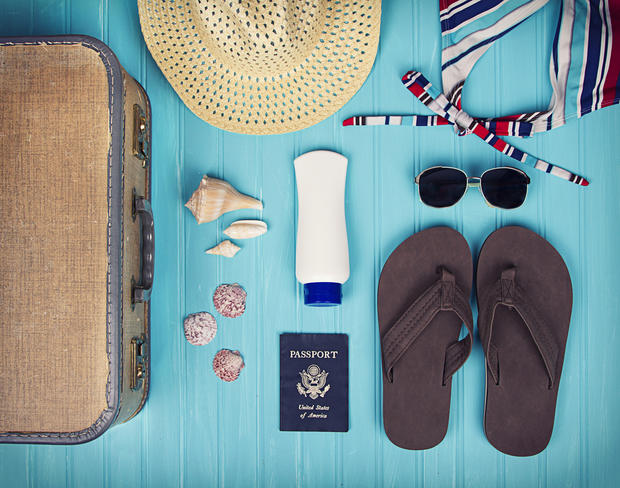 sunscreen sandals passport hat suitcase bikini 