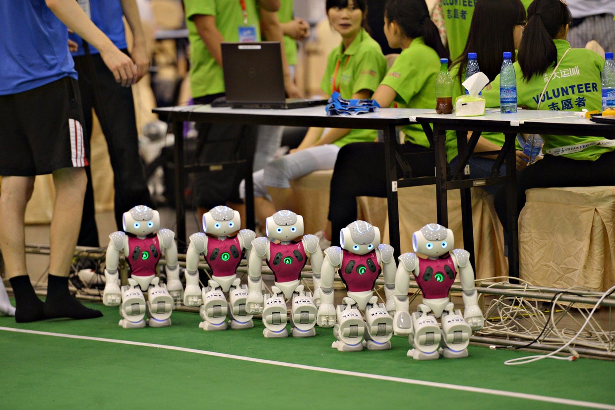 RoboCup 2015 - humanoid and non-humanoid robots compete in soccer ...