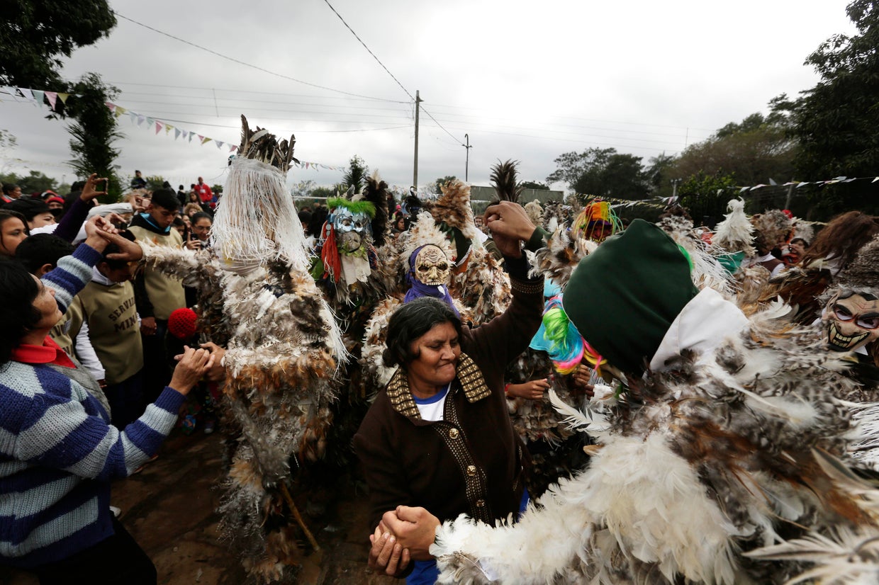 Dressing in feathers to honor a saint in Paraguay