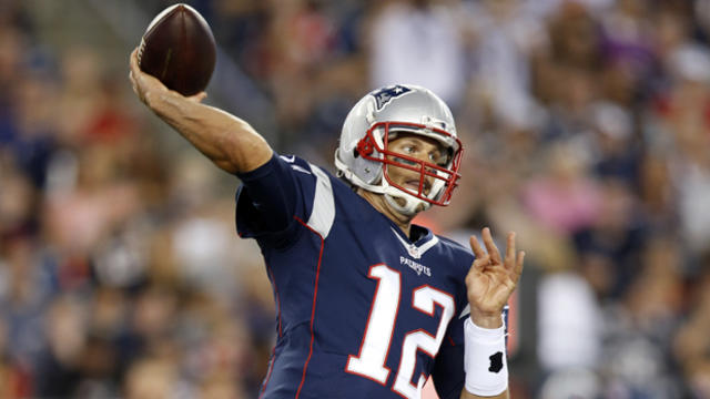 New England Patriots quarterback Tom Brady (12) makes a pass during the first half against the Green Bay Packers at Gillette Stadium in Foxborough, Massachusetts, Aug. 13, 2015. 