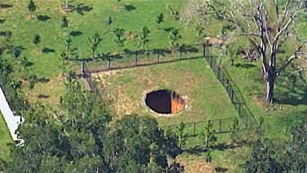 A sinkhole is seen in Seffner, Florida, Aug. 19, 2015. 