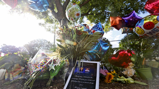 A makeshift memorial is assembled in front of WDBJ television station in Roanoke, Va., Aug. 26, 2015. 