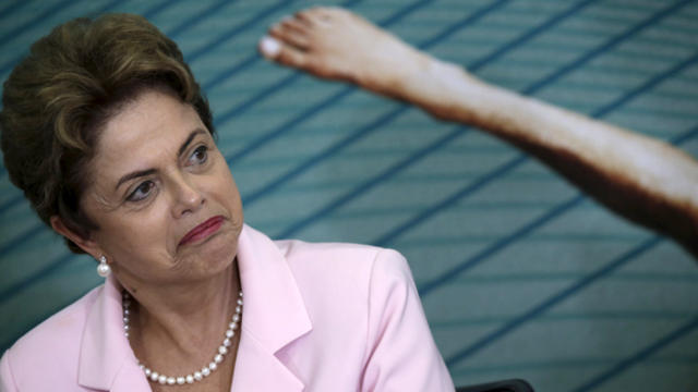 ​Brazil's President Dilma Rousseff reacts during a reception ceremony for the Brazilian delegations in the 2015 Pan American Games and Parapan American Games at the Planalto Palace in Brasilia, Brazil, Aug. 27, 2015. 