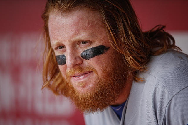 Dodgers' May saved flowing locks in high school by pitching well