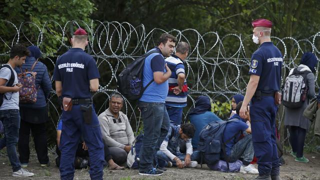 migrants2015-09-15t132638z645811164lr2eb9f11c3phrtrmadp3europe-migrants-hungary.jpg 